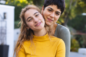 Two lesbians embracing. Starting Your Journey with Rainbow Fertility